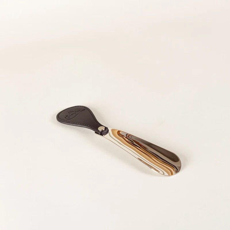 Black leather and metal shoe horn